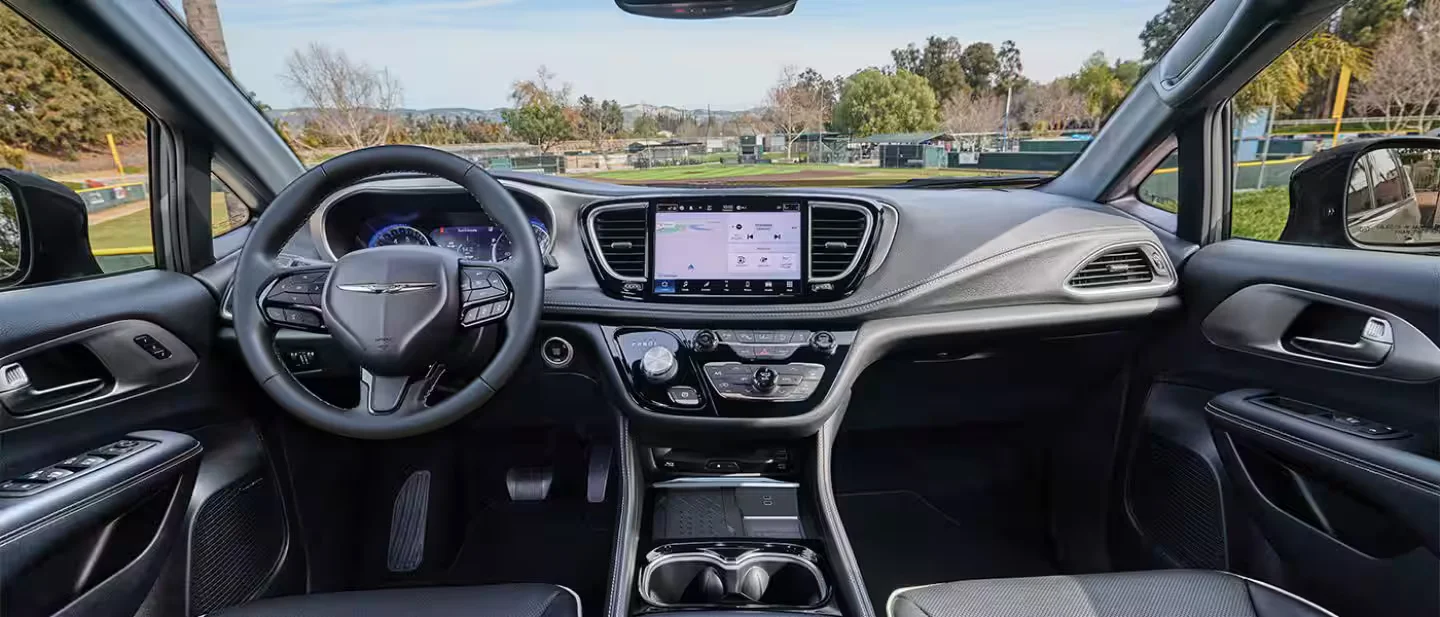 2026 Chrysler Pacifica front cabin with dashboard touchscreen and steering wheel